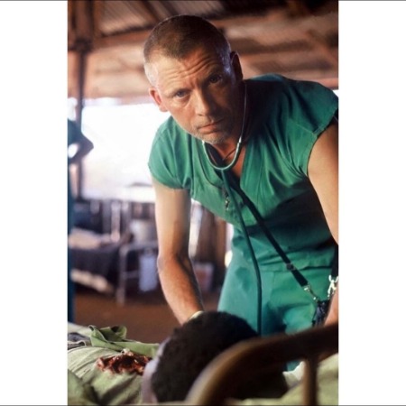 Callum Keith Rennie is posing for the photo.